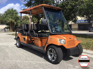 Orange Tomberlin 6 Passenger Golf Cart prime golf cars of vero beach, golf cart rentals